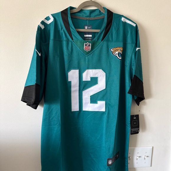 NFL Teal and Black Men's Jersey - Picture 1 of 6